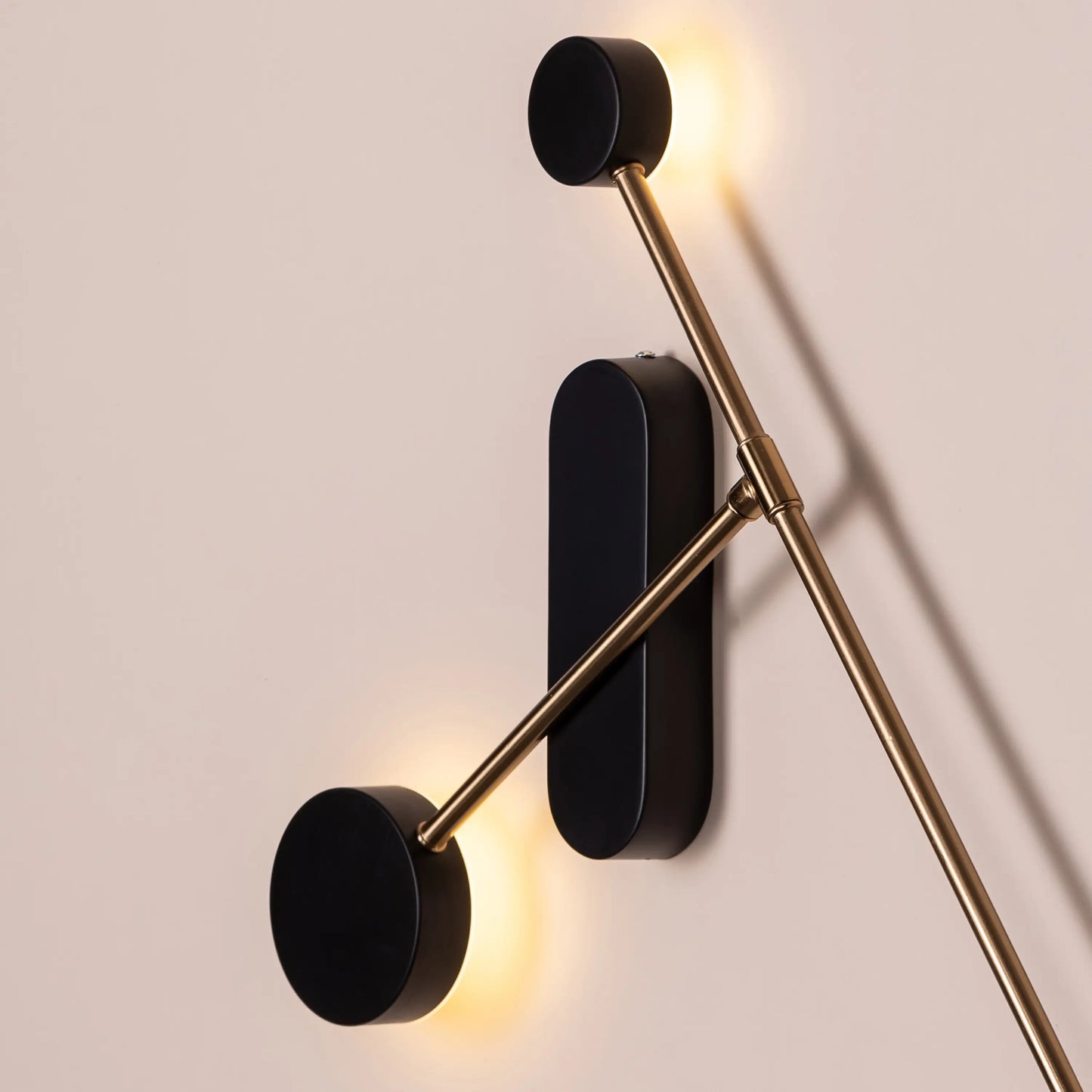 TIO's Touchdown (Gold, Built-In LED) Wall Light | Black and Gold finish